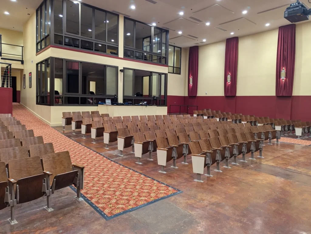 The auditorium seats and the stage, seen from the side